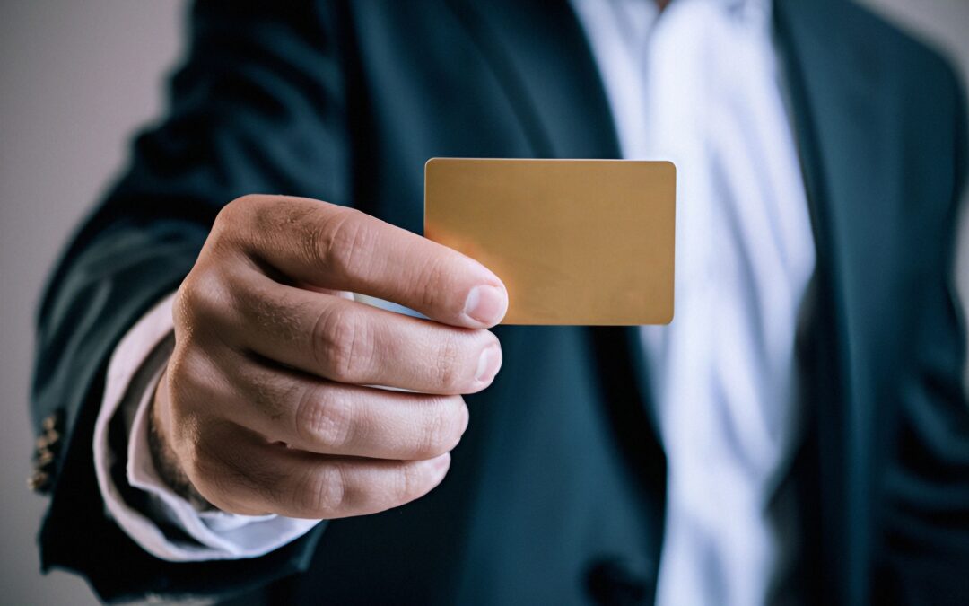 Man Holding Gold Card